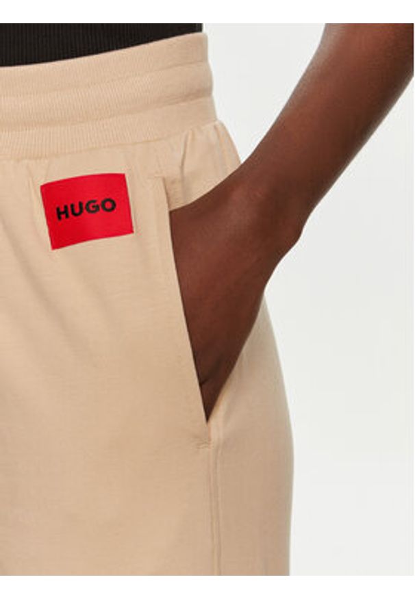 Hugo Spodnie dresowe Talua 50508694 Beżowy Relaxed Fit. Kolor: beżowy. Materiał: bawełna