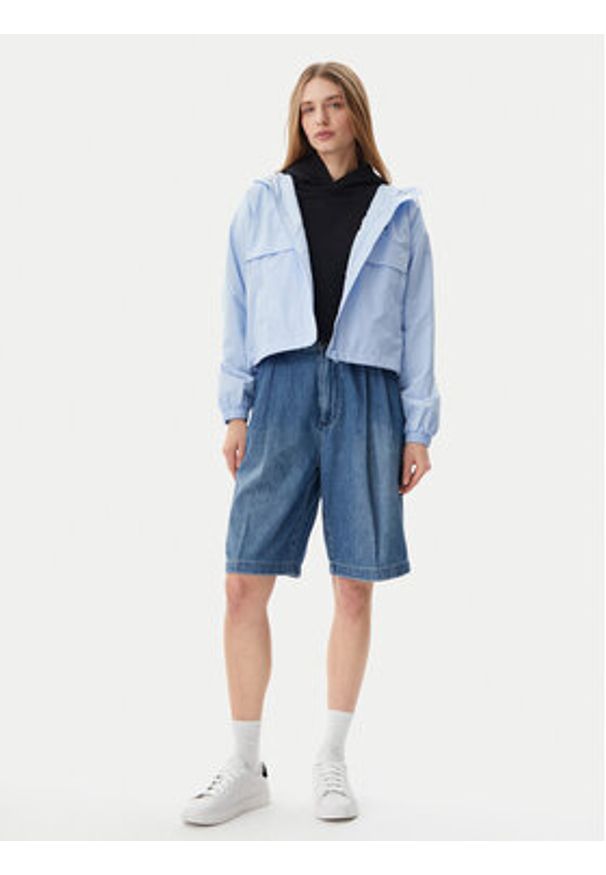 Tommy Jeans Wiatrówka Essential DW0DW20672 Błękitny Relaxed Fit. Kolor: niebieski. Materiał: syntetyk