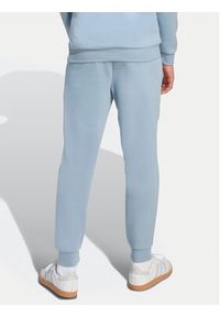 Adidas - adidas Spodnie dresowe JX2743 Błękitny Regular Fit. Kolor: niebieski. Materiał: bawełna #7