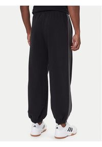 Adidas - adidas Spodnie dresowe Ess JM1703 Czarny Regular Fit. Kolor: czarny. Materiał: bawełna #3