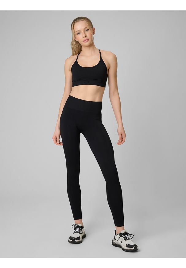 4f - 4F Legginsy treningowe bezszwowe damskie - czarne XS/S. Stan: podwyższony. Kolor: czarny. Materiał: skóra. Długość: długie. Sport: fitness