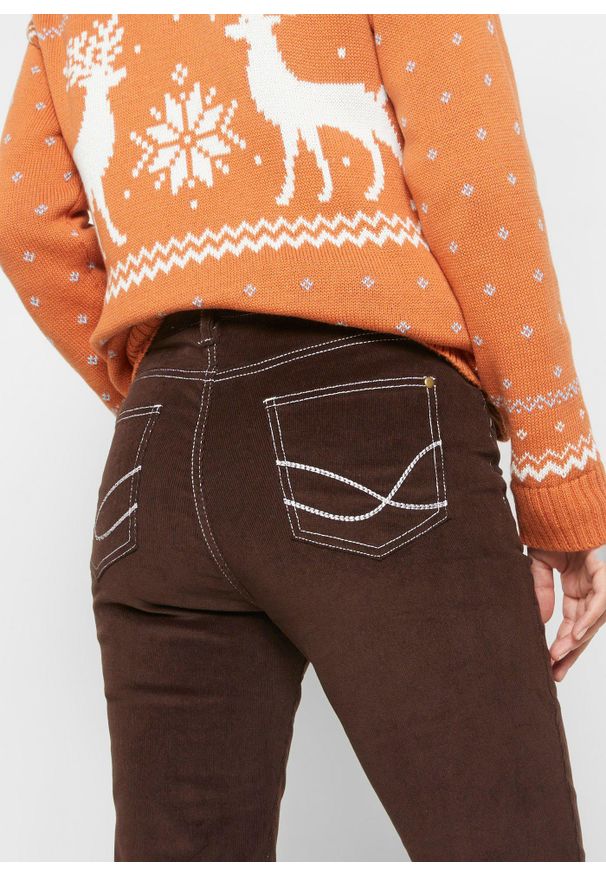 bonprix - Spodnie sztruksowe ze stretchem o kroju slim fit. Kolor: brązowy. Materiał: sztruks