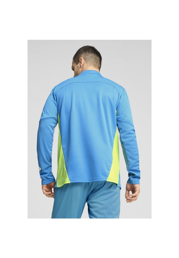 Puma - Męska bluza treningowa Manchester City z zamkiem 1/4 PUMA Magic Blue Yellow Glow. Kolor: żółty, wielokolorowy, niebieski