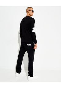 Alexander McQueen - ALEXANDER MCQUEEN - Czarna koszulka z logo. Kolor: czarny. Materiał: bawełna. Długość rękawa: długi rękaw. Długość: długie. Wzór: nadruk #2