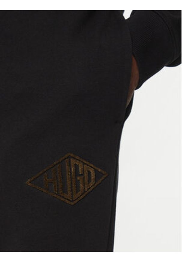 Hugo - HUGO Spodnie dresowe Dacusi 50534952 Czarny Relaxed Fit. Kolor: czarny. Materiał: bawełna