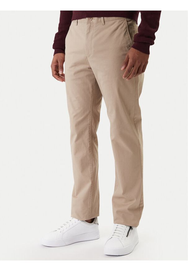 TOMMY HILFIGER - Tommy Hilfiger Chinosy Denton Essential MW0MW40262 Beżowy Straight Fit. Kolor: beżowy. Materiał: bawełna