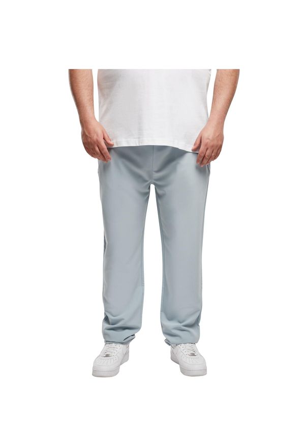 Spodnie do biegania Urban Classics Tapered. Kolor: niebieski. Materiał: dresówka