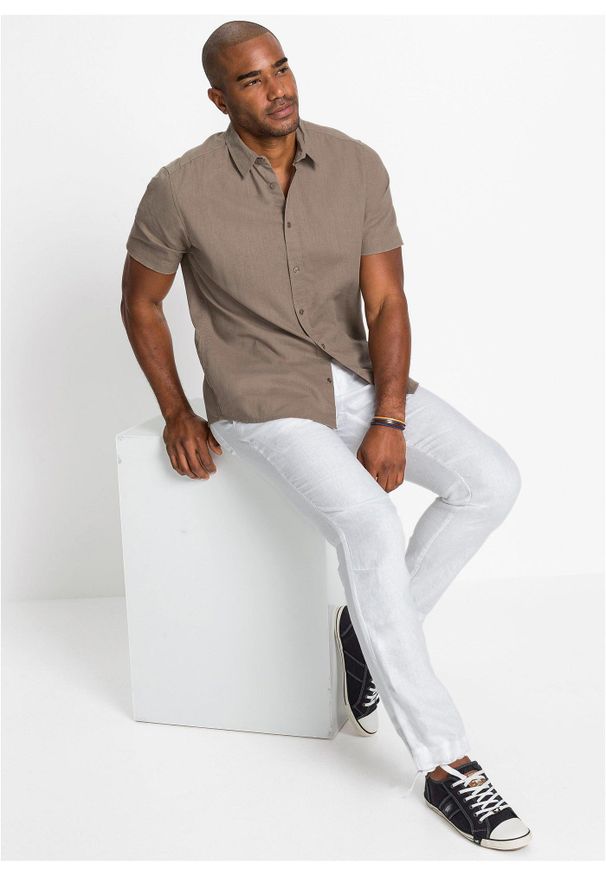 bonprix - Koszula z krótkim rękawem z przewiewnej mieszanki lnu. Kolor: brązowy. Materiał: len. Długość rękawa: krótki rękaw. Długość: krótkie. Sezon: lato
