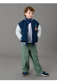 Sinsay - Jeansy wide leg z efektem sprania - khaki. Kolor: brązowy