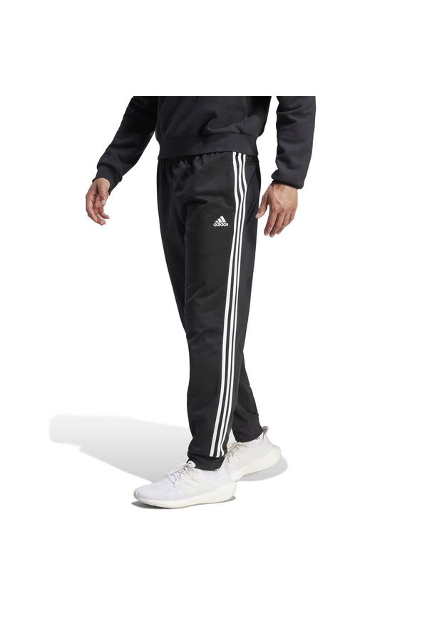 Adidas - Spodnie męskie adidas Primegreen Essentials Warm-Up Tapered 3-Stripes Track. Kolor: czarny, biały, wielokolorowy. Materiał: dresówka. Sport: fitness