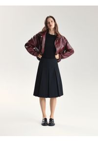Reserved - Rozkloszowana spódnica midi - czarny. Kolor: czarny. Materiał: dzianina #1