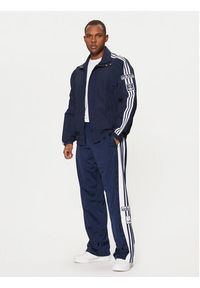 Adidas - adidas Spodnie dresowe Adibreak JD4268 Granatowy Loose Fit. Kolor: niebieski. Materiał: syntetyk #5