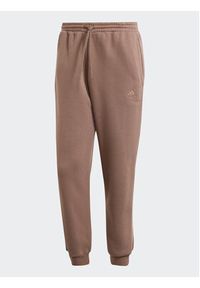 Adidas - adidas Spodnie dresowe IR8362 Brązowy Regular Fit. Kolor: brązowy. Materiał: bawełna, dresówka #3