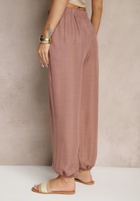 Renee - Brązowe Spodnie Joggery High Waist ze Ściągaczami Korilanea. Okazja: na co dzień. Stan: podwyższony. Kolor: brązowy. Styl: casual, elegancki