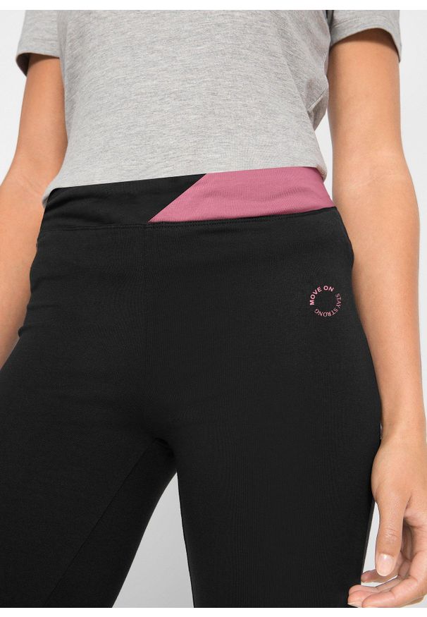 bonprix - Spodnie sportowe ze stretchem, poszerzane nogawki. Kolor: czarny. Materiał: materiał, bawełna. Styl: sportowy