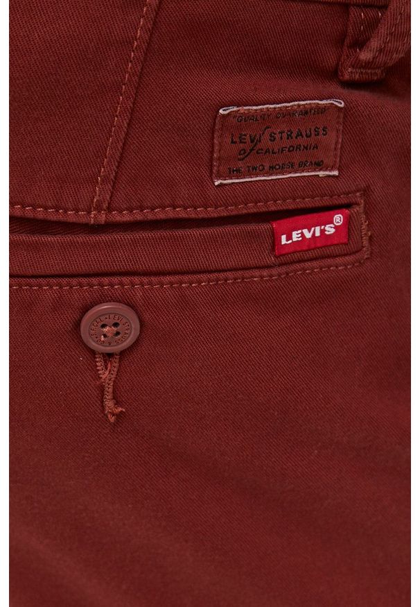 Levi's® - Levi's Spodnie męskie kolor pomarańczowy w fasonie chinos. Okazja: na spotkanie biznesowe. Kolor: pomarańczowy. Materiał: włókno, tkanina. Styl: biznesowy
