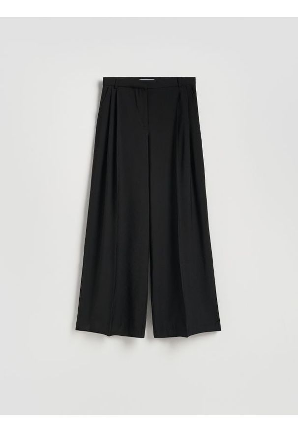 Reserved - Spodnie z szerokimi nogawkami - czarny. Kolor: czarny. Materiał: tkanina, wiskoza