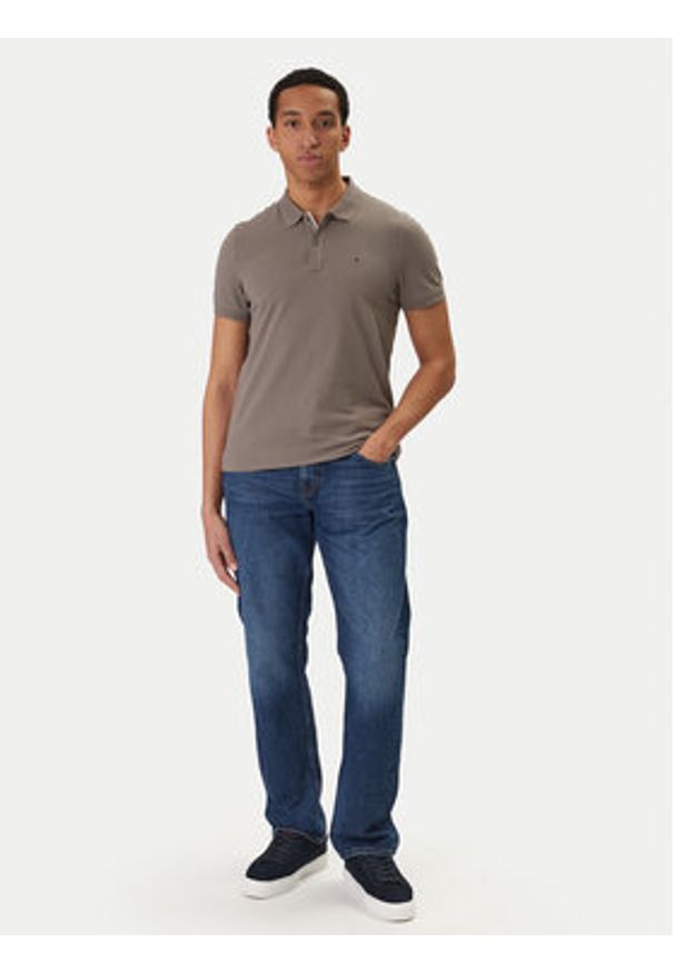 Tommy Jeans Polo DM0DM20676 Beżowy Slim Fit. Typ kołnierza: polo. Kolor: beżowy. Materiał: bawełna