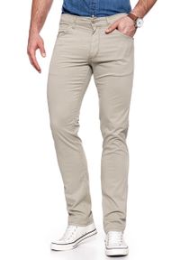 Wrangler - WRANGLER SPODNIE MĘSKIE GREENSBORO CAMEL WASHED W15QMM49J. Materiał: materiał