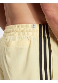 Adidas - adidas Szorty kąpielowe Originals Adicolor 3-Stripes Swim Shorts HT4410 Żółty Regular Fit. Kolor: żółty. Materiał: syntetyk