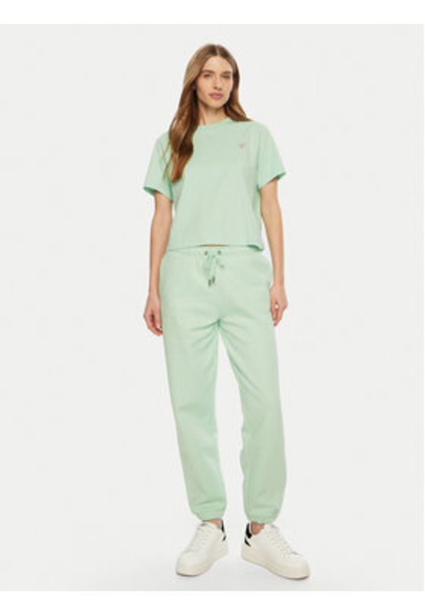 Guess Jeans Spodnie dresowe W4YB33 KC811 Zielony Regular Fit. Kolor: zielony. Materiał: bawełna