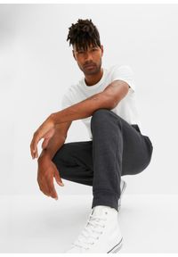 bonprix - Spodnie sportowe ocieplane, na polarowej podszewce. Kolor: czarny. Materiał: polar. Styl: sportowy #3