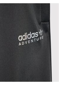 Adidas - adidas Spodnie dresowe Adventure HE2067 Czarny Regular Fit. Kolor: czarny. Materiał: syntetyk #4