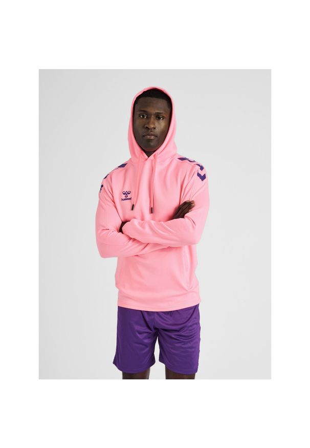 Bluza do piłki ręcznej dla dorosłych Hummel hml CORE XK poly z kapturem. Typ kołnierza: kaptur. Kolor: różowy. Sezon: zima. Sport: piłka ręczna