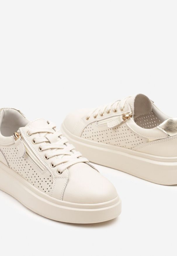 Renee - Beżowe Sneakersy ze Skóry Naturalnej ze Skórzaną Wkładką i Perforacją Falothra. Okazja: na co dzień. Nosek buta: okrągły. Zapięcie: sznurówki. Kolor: beżowy. Materiał: skóra. Wzór: aplikacja
