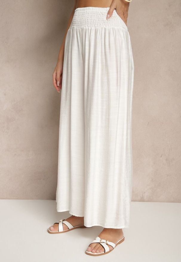 Renee - Jasnobeżowe Spodnie z Wiskozą o Szerokim Kroju High Waist Orrana. Okazja: na co dzień. Stan: podwyższony. Kolor: beżowy. Materiał: wiskoza. Styl: elegancki, casual