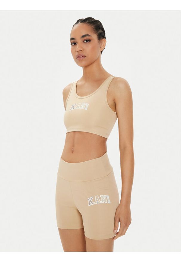 Karl Kani Biustonosz top Small Serif 6131306 Beżowy Slim Fit. Kolor: beżowy. Materiał: syntetyk
