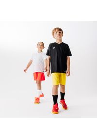 KIPSTA - Spodenki piłkarskie dla dzieci Kipsta Essential. Kolor: czerwony, pomarańczowy, wielokolorowy. Materiał: materiał, poliester. Styl: sportowy