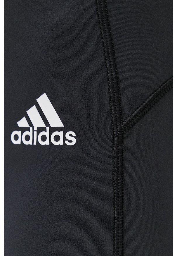 Adidas - adidas Legginsy GL4029 damskie kolor czarny z nadrukiem. Kolor: czarny. Materiał: dzianina, materiał. Wzór: nadruk