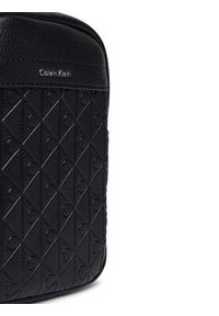 Calvin Klein Saszetka Emblem Aop Emboss Slim Reporter LV04D3228G Czarny. Kolor: czarny. Materiał: skóra #6