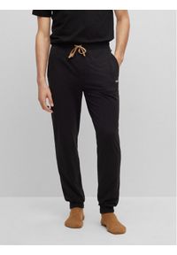 BOSS - Spodnie dresowe Boss. Kolor: czarny. Materiał: bawełna, dresówka #1