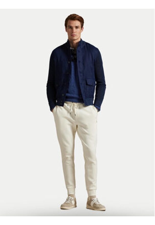 Polo Ralph Lauren Spodnie dresowe 710881518058 Écru Regular Fit. Materiał: syntetyk