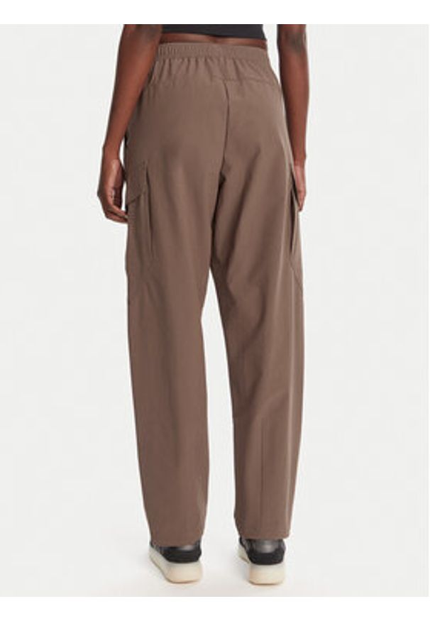 Adidas - adidas Spodnie outdoor Terrex Xploric JM9857 Brązowy Loose Fit. Kolor: brązowy. Materiał: syntetyk. Sport: outdoor