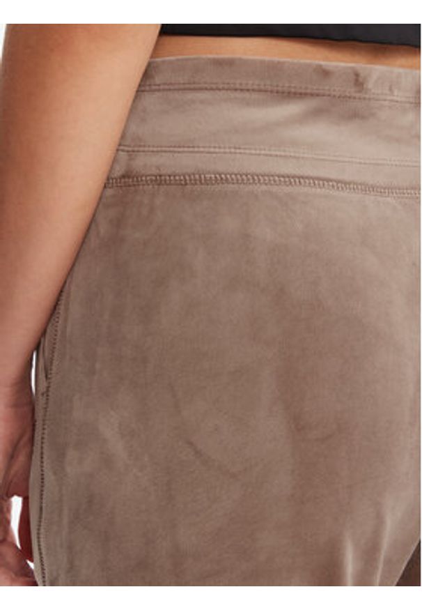 DKNY Sport Spodnie dresowe DP5P3710 Beżowy Regular Fit. Kolor: beżowy. Materiał: syntetyk