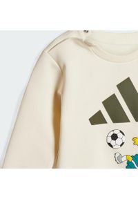 Adidas - Dziecięce spodnie dresowe The Simpsons. Kolor: biały. Materiał: dresówka