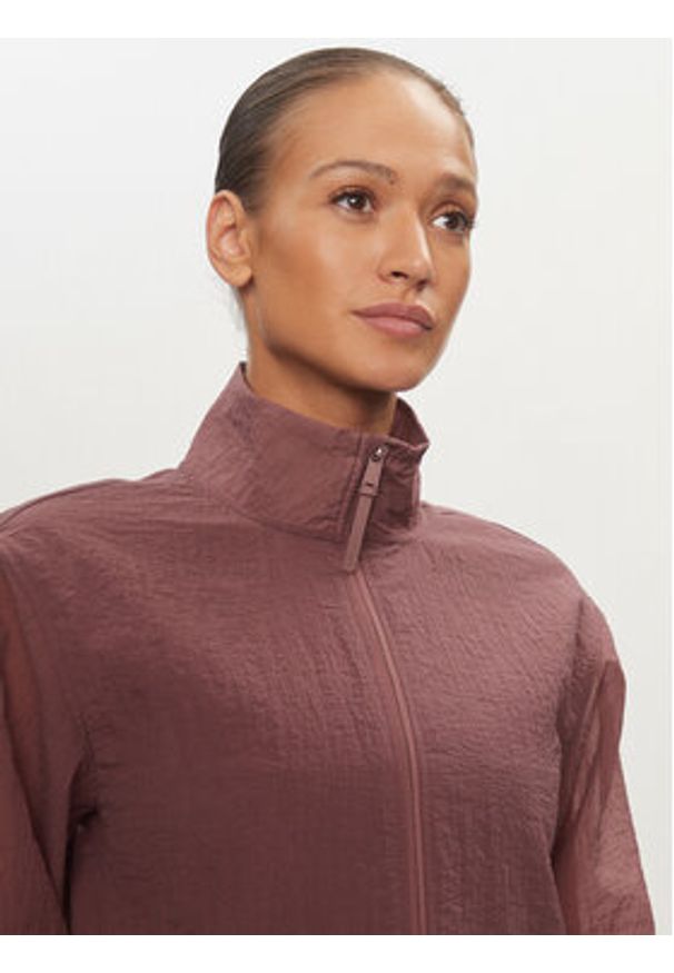 Calvin Klein Performance Wiatrówka 00GWS4O516 Różowy Relaxed Fit. Kolor: różowy. Materiał: syntetyk