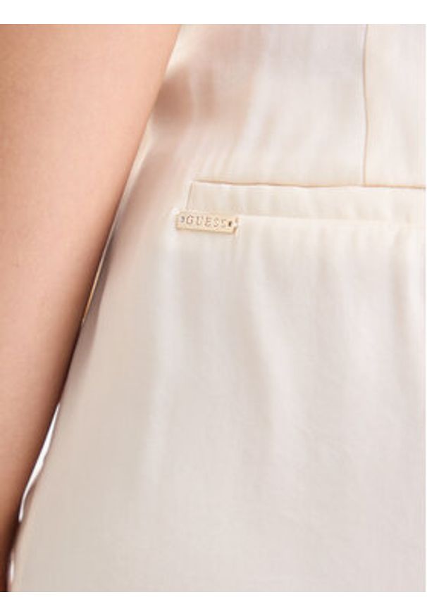 Guess Spodnie materiałowe W5YB02 WH5N2 Écru Regular Fit. Materiał: syntetyk