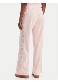 Adidas - adidas Spodnie dresowe Firebird Lace KC6444 Różowy Loose Fit. Kolor: różowy. Materiał: syntetyk #4