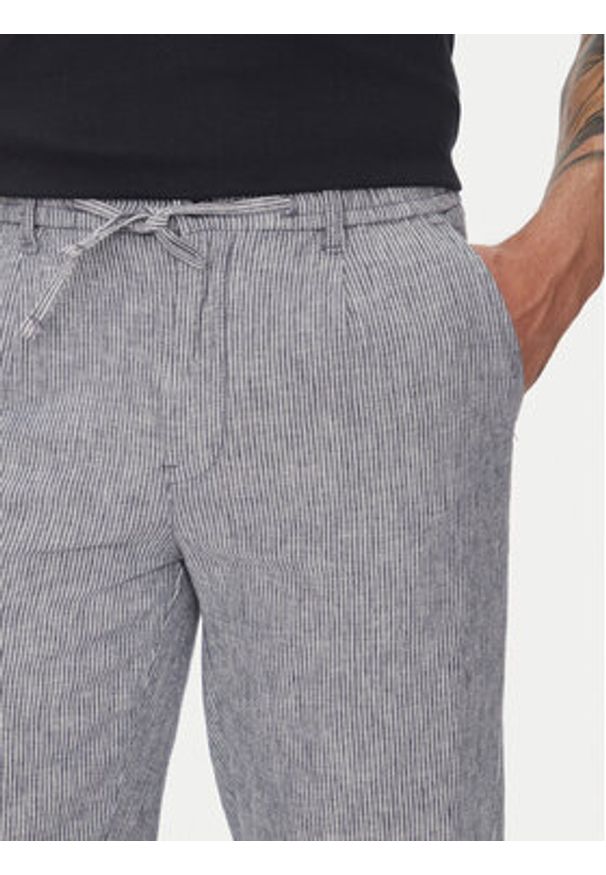 Lindbergh Spodnie materiałowe 30-003030 Niebieski Relaxed Fit. Kolor: niebieski. Materiał: bawełna