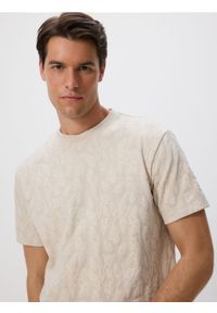 Reserved - T-shirt comfort z nadrukiem - kremowy. Kolor: kremowy. Materiał: bawełna, dzianina. Wzór: nadruk