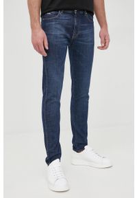 Emporio Armani jeansy męskie. Kolor: niebieski