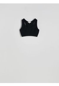 Reserved - Bezszwowy top w stylu sportowym - czarny. Kolor: czarny. Materiał: prążkowany, dzianina. Długość: krótkie. Styl: sportowy #1