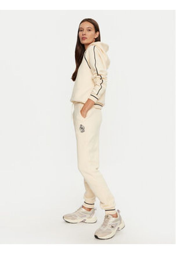Guess Spodnie dresowe Nia V4BB06 KCHU1 Beżowy Regular Fit. Kolor: beżowy. Materiał: bawełna