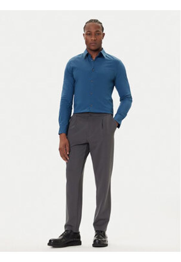 Calvin Klein Chinosy LV04LE613G Szary Slim Fit. Kolor: szary. Materiał: wiskoza