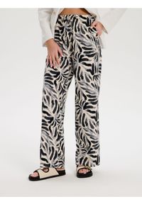 Sinsay - Spodnie wide leg - wielobarwny. Materiał: len, materiał