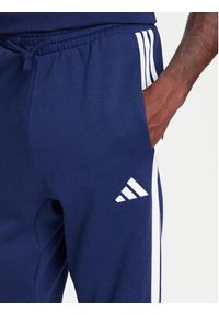 Adidas - adidas Spodnie dresowe Essentials 3-Stripes JD1859 Niebieski Regular Fit. Kolor: niebieski. Materiał: syntetyk #5